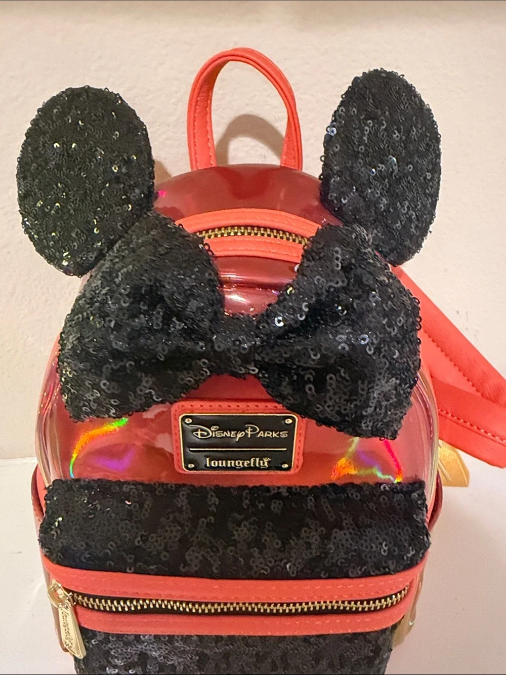 Loungefly Kids Iridescent Orange Mini Backpack with Black Sequin Bow & Ears